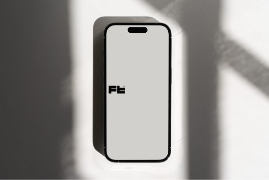Smartphone mockup on a white background with diagonal shadows, sleek design for app presentation, digital asset for designers.